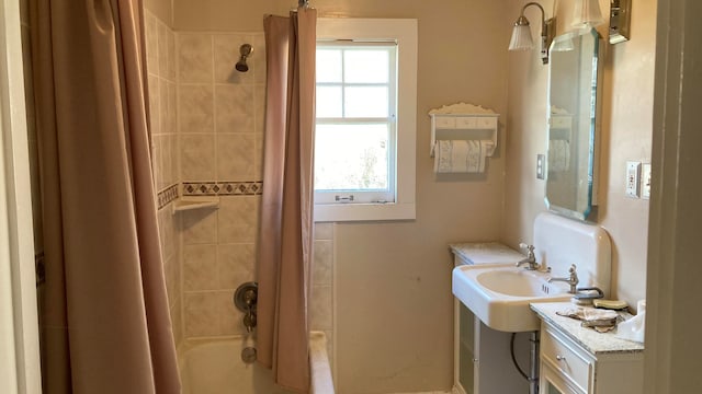 bathroom with shower / bath combo