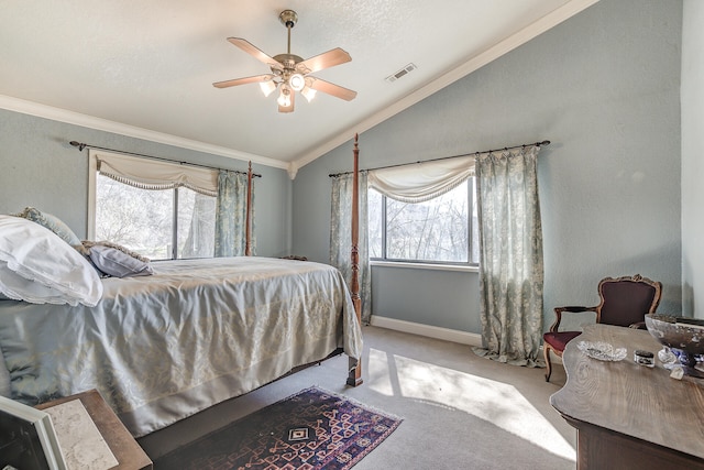 carpeted bedroom with visible vents, multiple windows, lofted ceiling, and ornamental molding