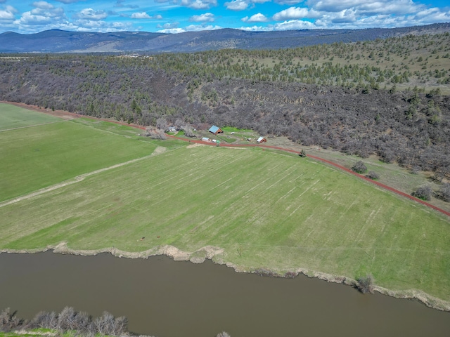 bird's eye view featuring a water and mountain view