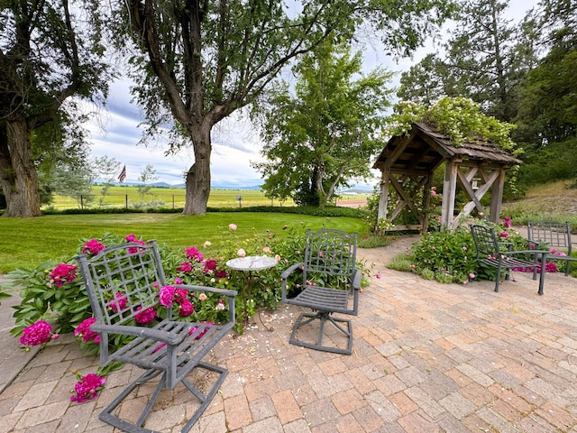 view of patio with a rural view