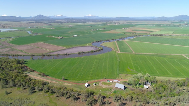 644-705 Pit River Canyon Rd, Mcarthur, CA 96056 - aerial view of property's location featuring rural landscape, a water and mountain view, and farmland