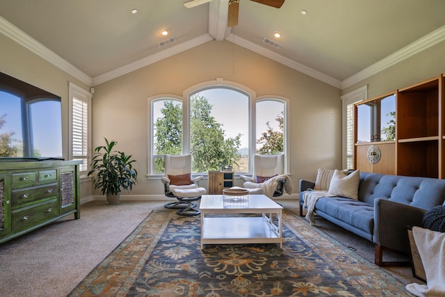 living room with a healthy amount of sunlight, ceiling fan, lofted ceiling with beams, and carpet flooring