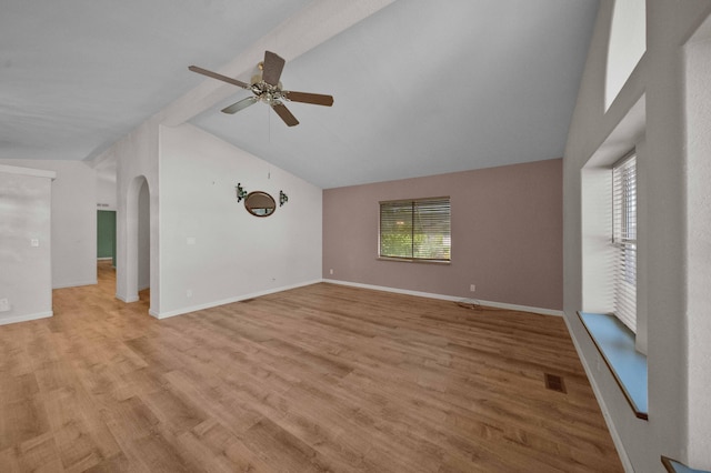 unfurnished living room featuring ceiling fan, vaulted ceiling, and light wood-type flooring