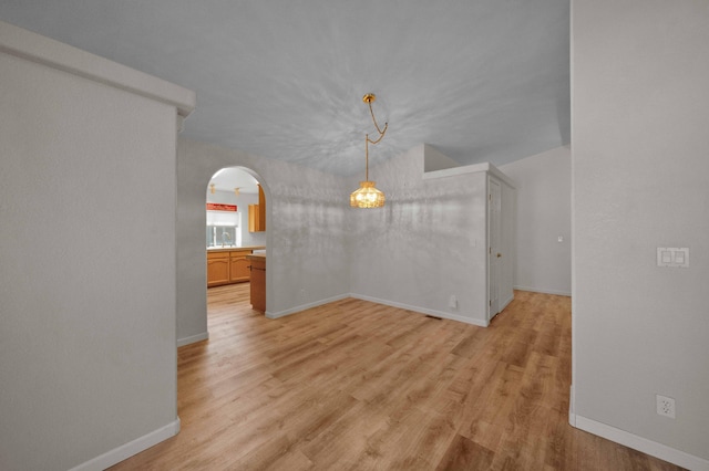 empty room with light wood-type flooring