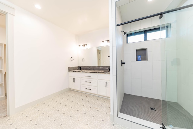 bathroom with dual bowl vanity, tile flooring, and a shower with door