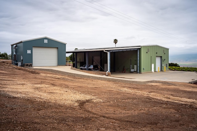 view of outdoor structure with a garage