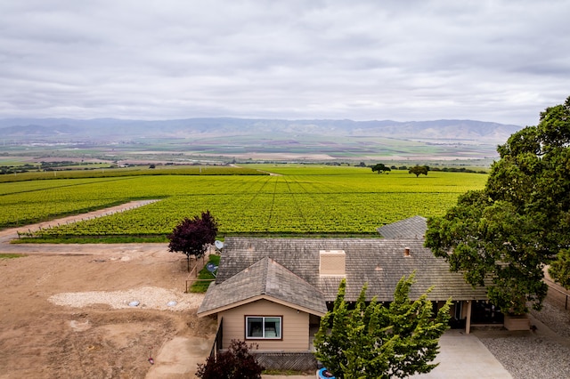 bird's eye view with a mountain view and a rural view