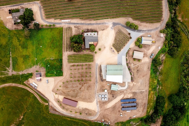 birds eye view of property featuring a rural view