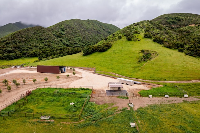 birds eye view of property featuring a rural view and a mountain view