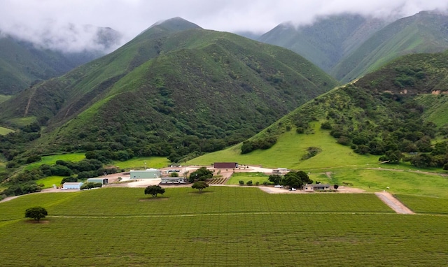 view of mountain feature with a rural view