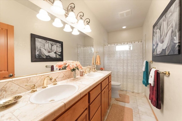 bathroom featuring dual sinks, tile flooring, toilet, and large vanity