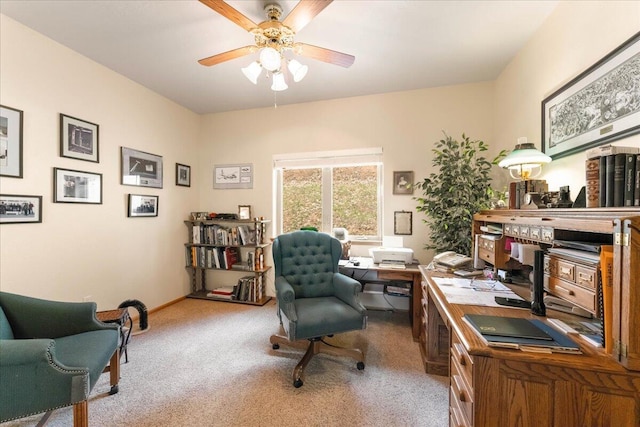 carpeted office with ceiling fan