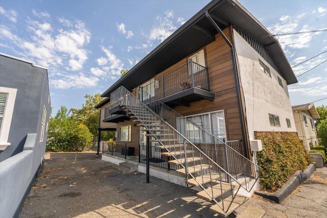 view of home's exterior featuring a balcony