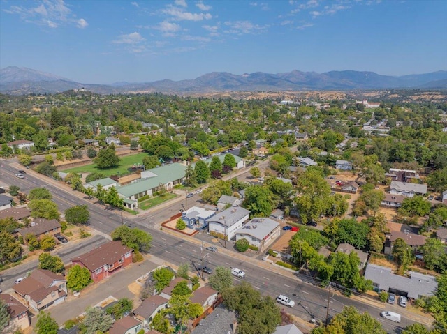 birds eye view of property featuring a mountain view