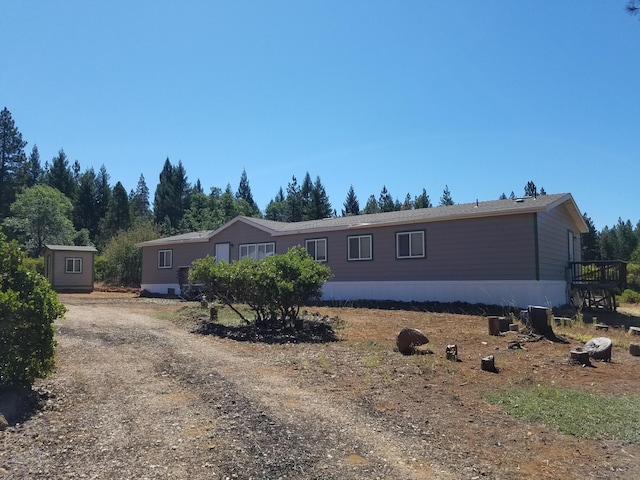 manufactured / mobile home featuring a storage unit