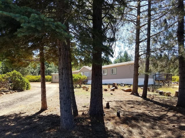 view of yard with a deck