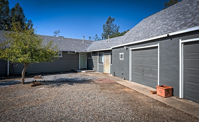 single story home featuring a garage