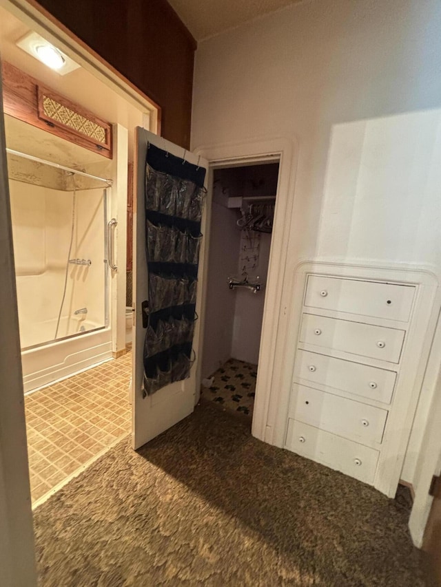 bathroom featuring washtub / shower combination