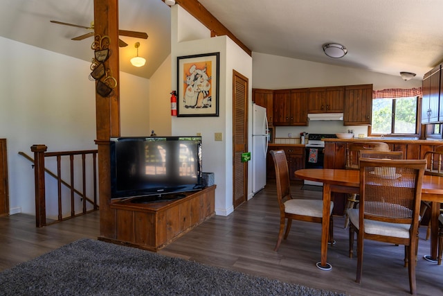 dining space featuring ceiling fan, dark hardwood / wood-style flooring, and vaulted ceiling