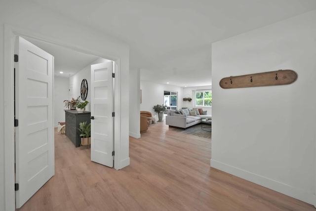 hall featuring light wood-type flooring