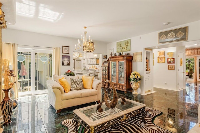 living room with an inviting chandelier