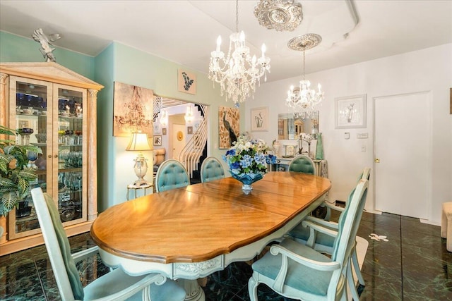 dining space featuring an inviting chandelier