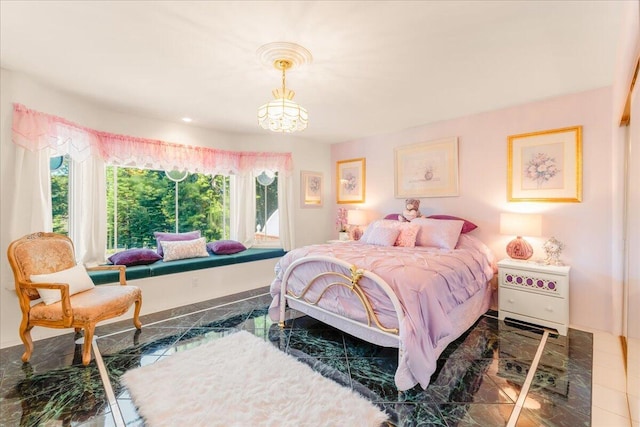 tiled bedroom with an inviting chandelier and multiple windows