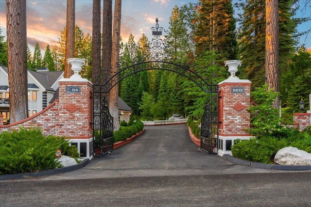 view of gate at dusk