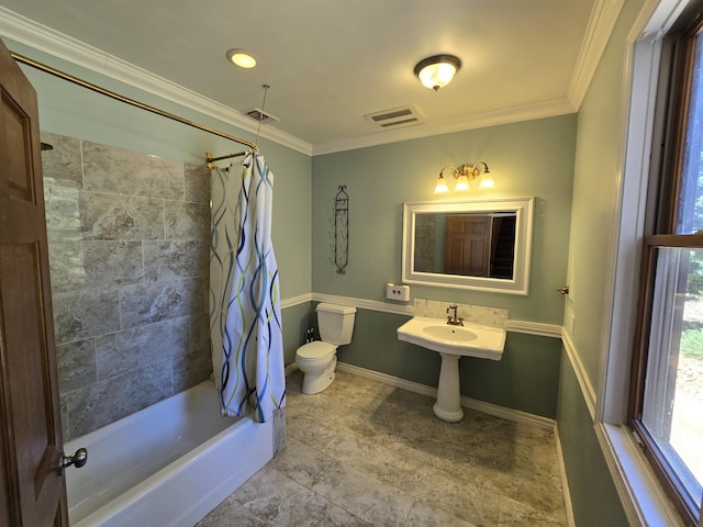 bathroom featuring shower / bath combo, crown molding, and toilet