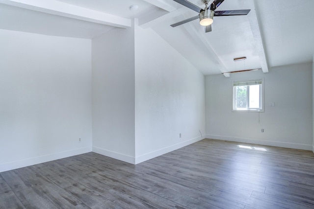 unfurnished room with baseboards, ceiling fan, and wood finished floors