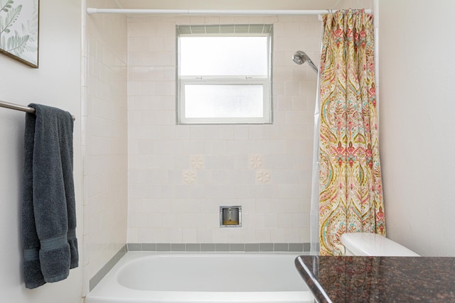 full bathroom with shower / tub combo with curtain