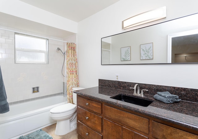 full bathroom featuring toilet, shower / tub combo with curtain, and vanity