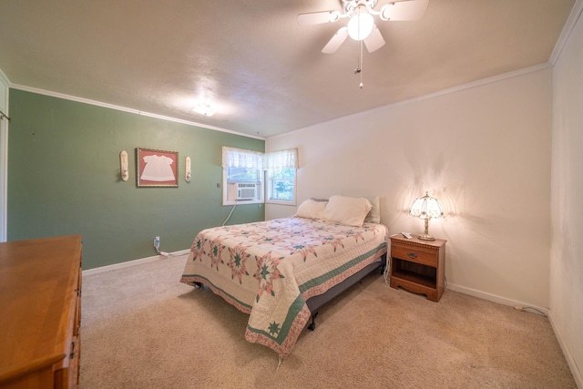 carpeted bedroom with cooling unit, ornamental molding, and ceiling fan