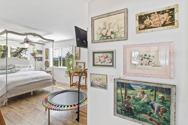 bedroom with hardwood / wood-style floors