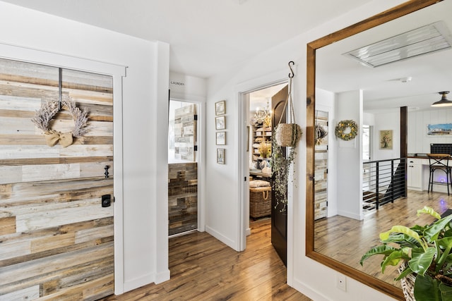 corridor featuring hardwood / wood-style flooring