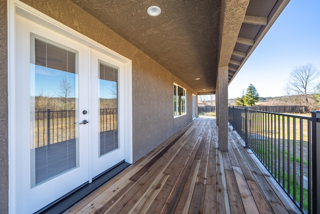 wooden deck with french doors