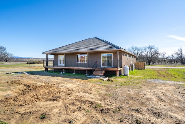 back of house featuring a rural view