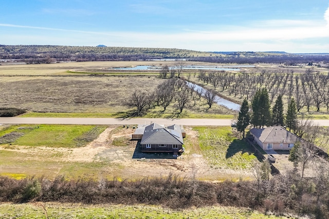 bird's eye view with a rural view and a water view