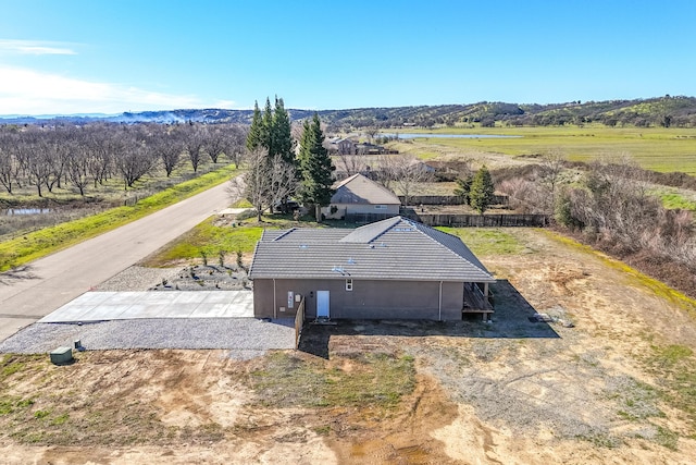 birds eye view of property with a rural view and a water and mountain view