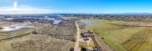 aerial view featuring a water view and a rural view