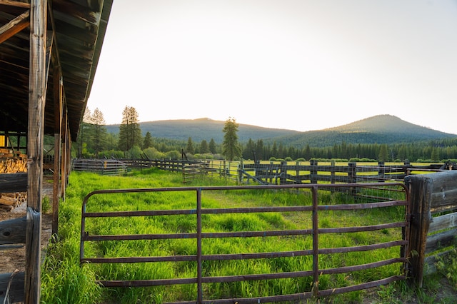 exterior space with a mountain view and a rural view