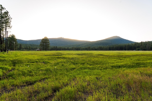 view of mountain feature with a rural view