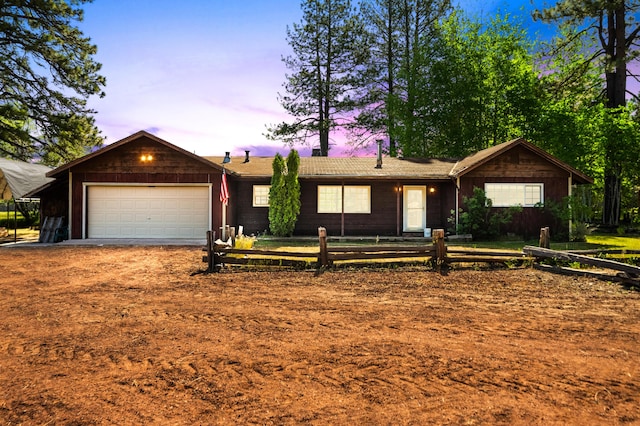 ranch-style house with a garage