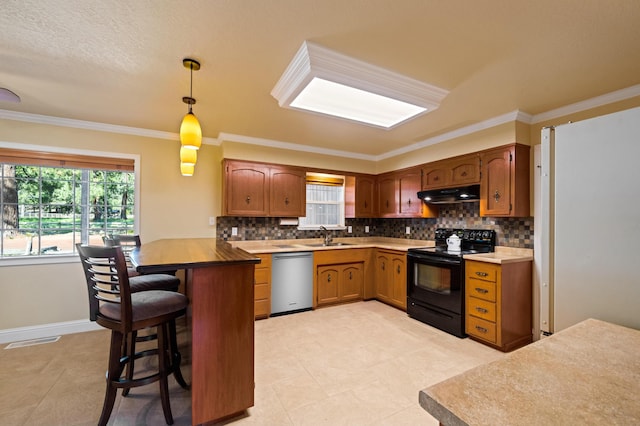 kitchen with kitchen peninsula, a kitchen breakfast bar, stainless steel dishwasher, black electric range oven, and hanging light fixtures