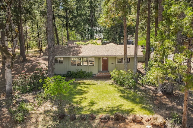 ranch-style house with a front yard