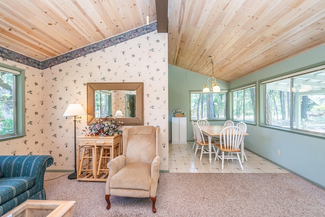 interior space featuring a notable chandelier, lofted ceiling, carpet floors, and wood ceiling