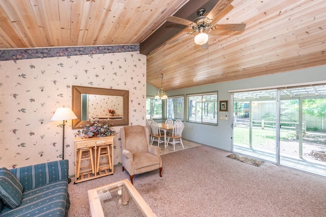 carpeted living room with high vaulted ceiling, beam ceiling, ceiling fan, and wood ceiling