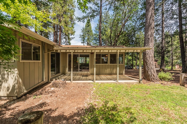 exterior space with a front yard and a patio