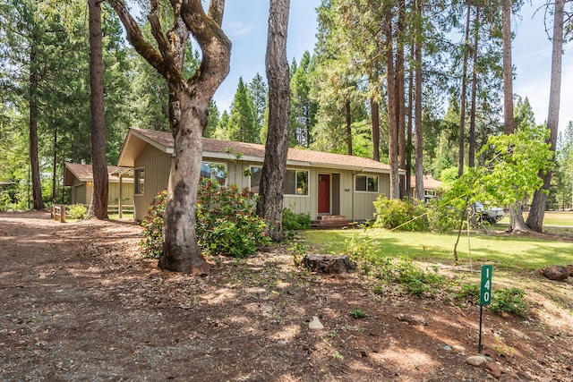 ranch-style home with a front yard