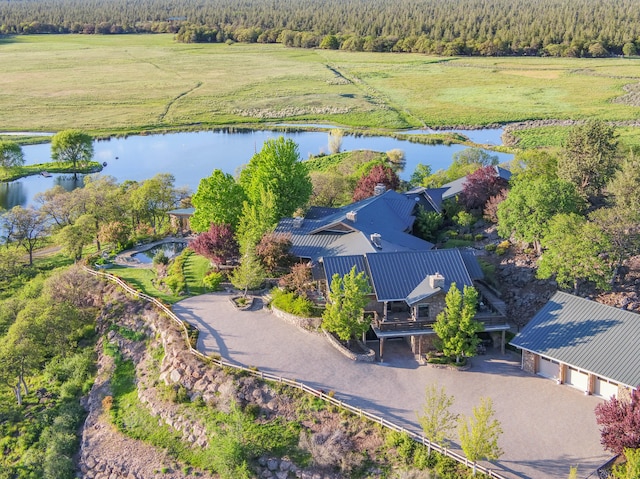 aerial view featuring a rural view and a water view